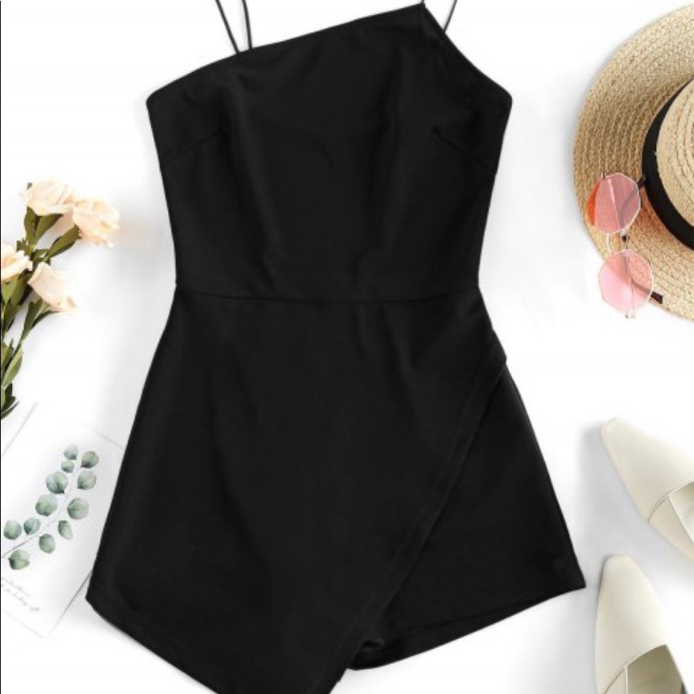Never worn, brand new asymmetric black romper